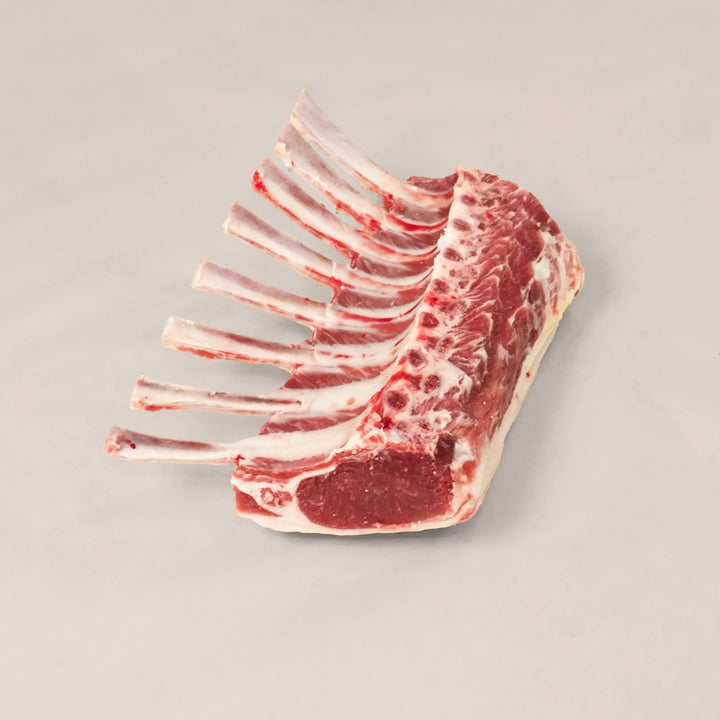 Artisan Rack of Lamb showcasing exquisite flavor, hand-trimmed for unmatched culinary elegance.