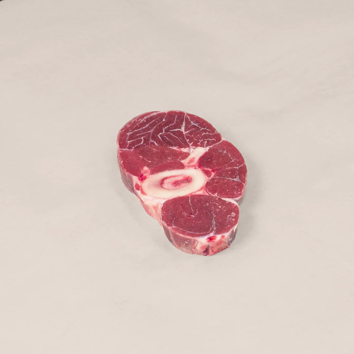 High-quality veal osso buco shank, ethically sourced, perfect for slow cooking and gourmet meals.